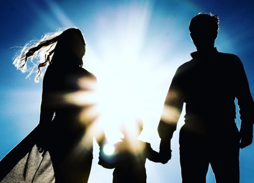 man and woman holding hands